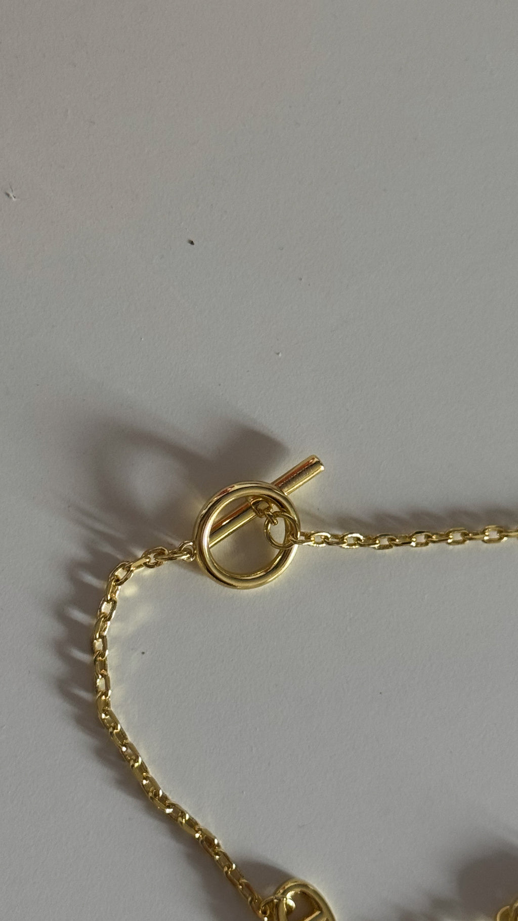 Sautoir Herms charm